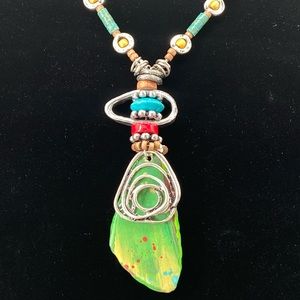 TRESKA COLLECTION. Green, red and silver faux stone necklace. 18”-22” long.